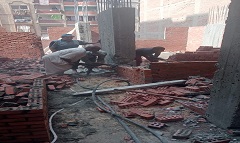 استمرار إزالة مخالفات المباني بنطاق الحي 