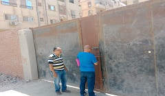 غلق وتشميع جراج مخالف بنطاق الحي