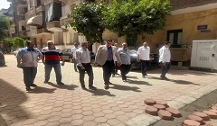 متابعة تنفيذ خطة الرصف والتطوير بنطاق الحى