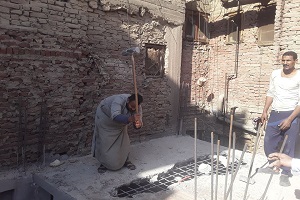 ازالة عقارين بشارع مسطرد بحي المطرية