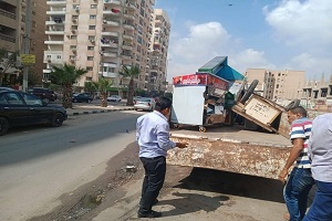 حملة لرفع اشغالات الكافيهات بالحي