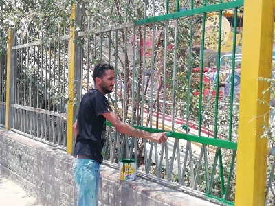 اعمال تطوير بحديقة جسر السويس