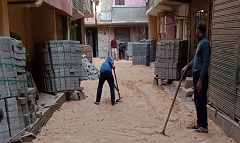 تركيب بلاط انترلوك بمتفرعات شارع الفرن