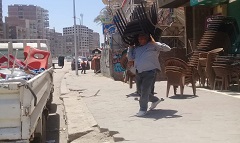 حملة لرفع الإشغالات بشارعى مؤسسة الزكاة وعبدالله رفاعى