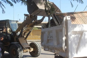 رفع الاشغالات بشوارع حى الساحل