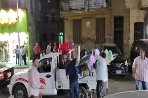 حملة لرفع الإشغالات بشارع البنهاوي