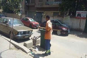 أعمال نظافة ورفع مخلفات بشارع الحمام بحي مصر الجديدة