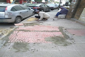 عملية إعادة الشئ لأصله لبلاط رصيف