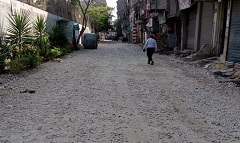 فرد طبقة الاساس وصب بردورات بشارع ترعة الغزالى