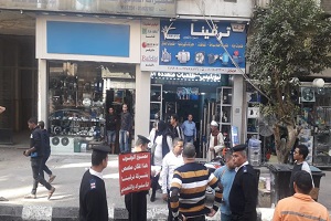 حملة لرفع الإشغالات بشوارع الحي