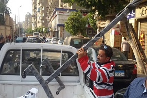 إزالة حواجز حديدية و اعلان مخالف بحي عابدين