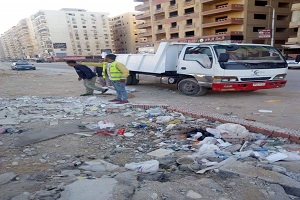رفــع المخلفـات بشـارع الخمسـين بــزهـراء المعادي