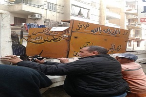 حملة لرفع الإشغالات بالحي