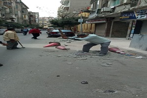 إزالة حواجز حديدية بالحي