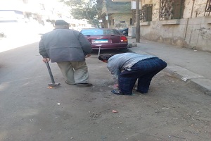 ازالة الحواجز الحديديه بشوارع الحي