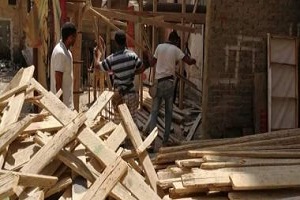 حملات لرفع الإشغالات والقمامة بشوارع الحي