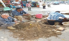 تطهير بالوعات الأمطار بالحي