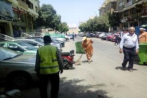 أعمال نظافة ورفع مخلفات بالحي