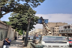 صيانة أعمدة الإنارة بالحي