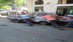  رفع السيارات المهملة والمتروكة فى الشوارع بنطاق الحي 