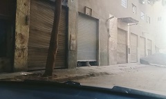 استمرار متابعة مواعيد غلق المحلات والورش بنطاق الحي