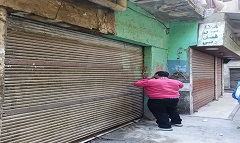غلق محل مخالف بشارع الشيخ حماد