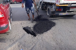 أعمال اسفلت وإعادة الشئ لأصله بالحي
