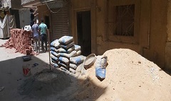 إيقاف اعمال تعدى على رصيف بنطاق الحي 